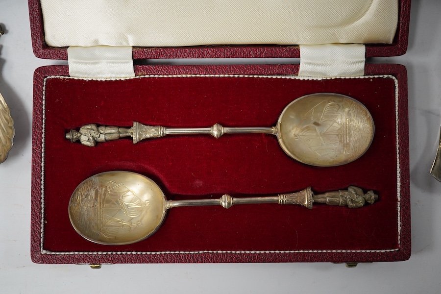 A cased Victorian engraved silver four piece christening set, by William Hutton & Sons Ltd, London, 1895, comprising a spoon, knife, fork and napkin ring, together with a cased set of six silver teaspoons, a cased pair o